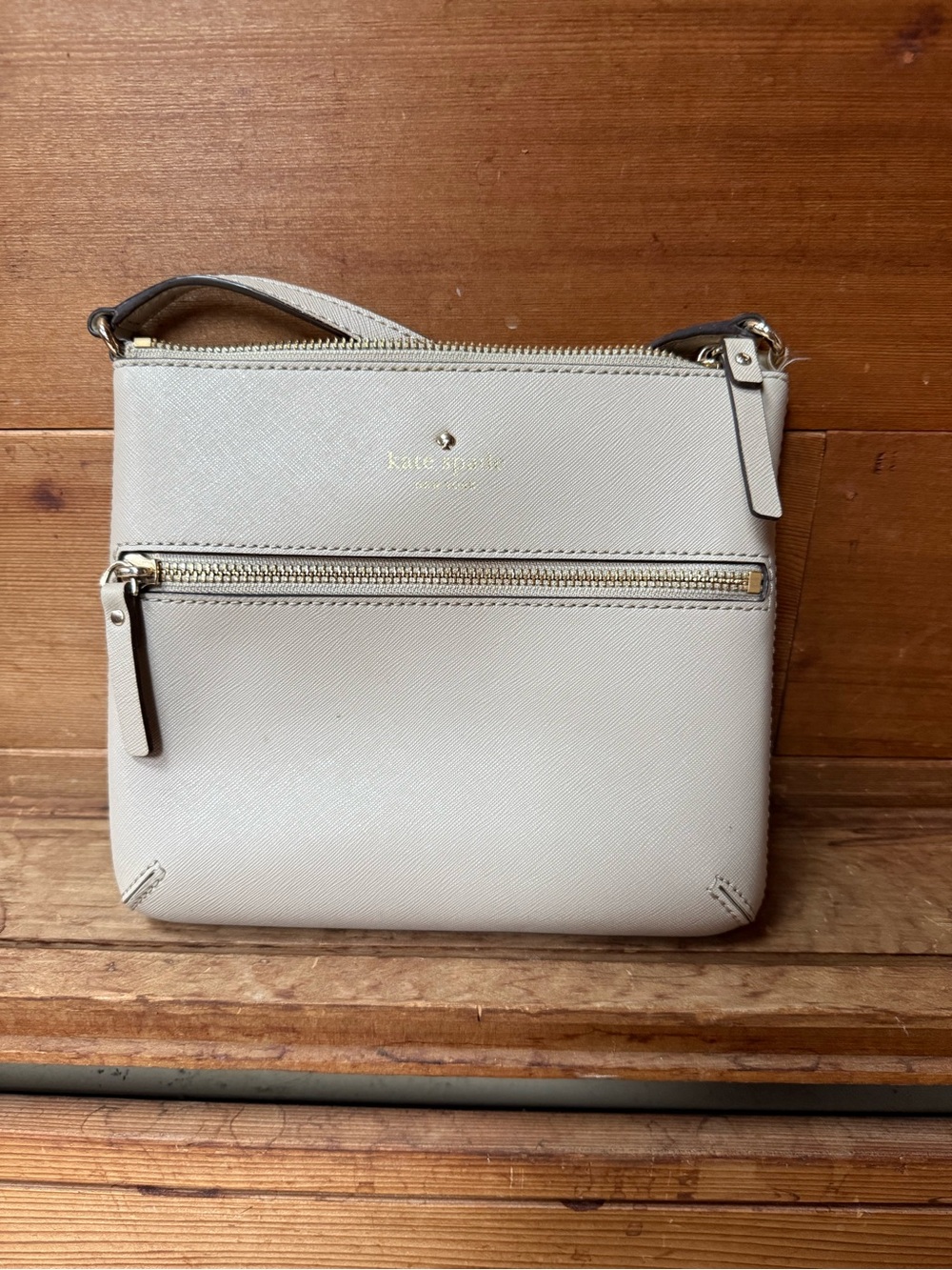 kate spade cream crossbody with gold hardware
